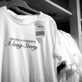 a couple of shirts that are on a rack