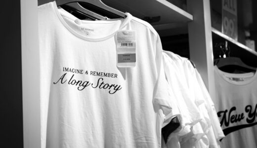 a couple of shirts that are on a rack